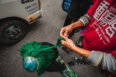 High angle view of man working on street