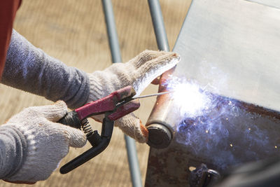 Welder working on a factory