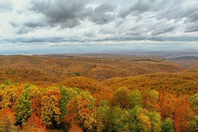 Scenic view of landscape against sky during autumn