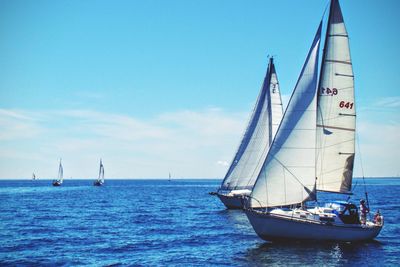 Boats sailing in sea