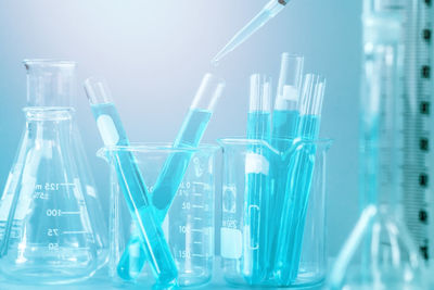 Close-up of test tubes on table