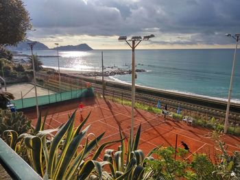 High angle view of swimming pool at beach against sky
