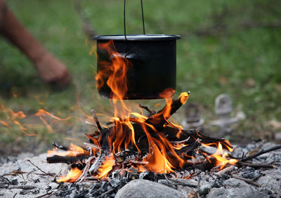 Close-up of bonfire on field