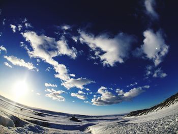 Sun shining through clouds