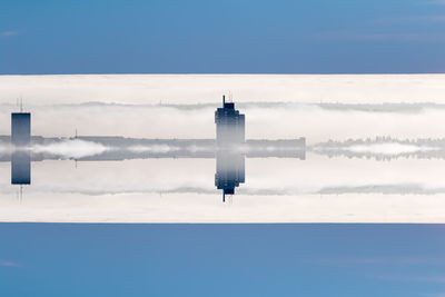 Low angle view of building against cloudy sky