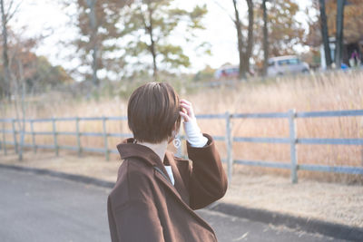 Portrait of boy drinking water