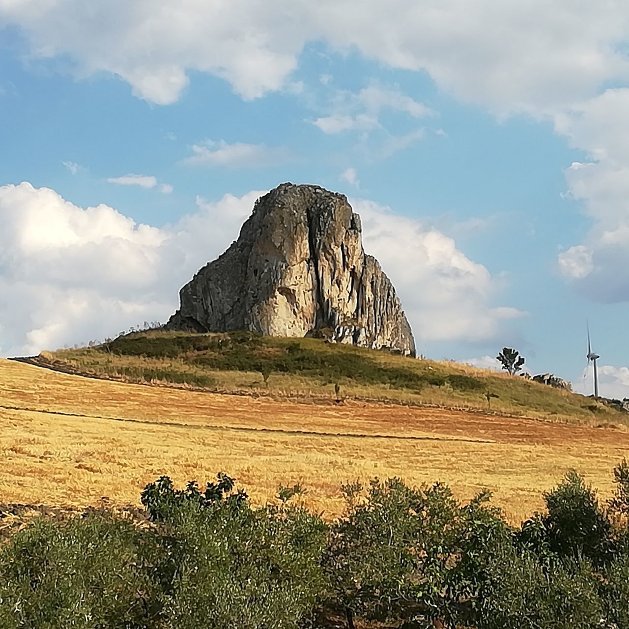 SCENIC VIEW OF ROCK FORMATIONS ON LANDSCAPE AGAINST SKY