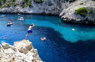 Cliff jumper in calanques de marseille