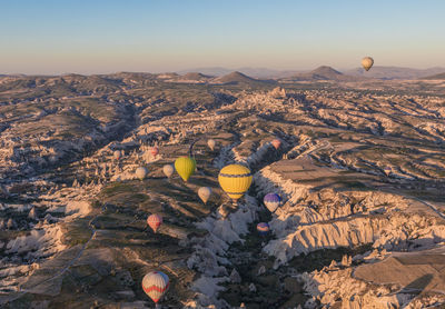 Aerial view of landscape with mountain range in background