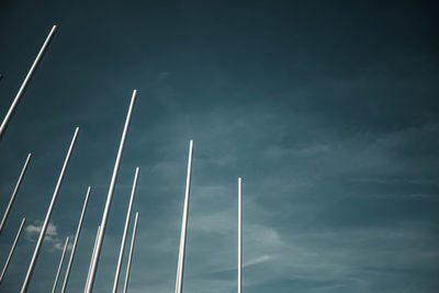 Low angle view of vapor trail against blue sky