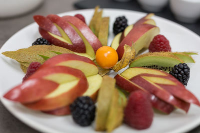 Close-up of fruits in plate