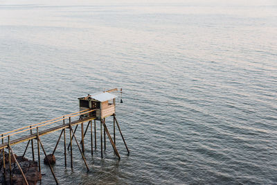 High angle view of built structure by sea