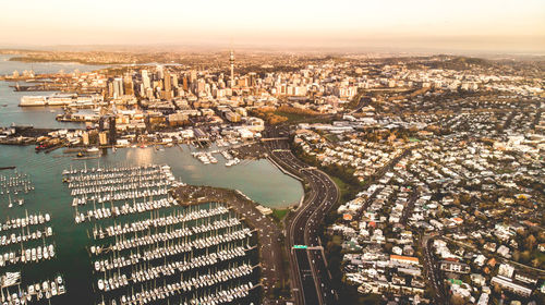 High angle view of city buildings against sky