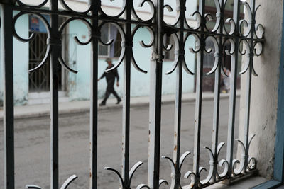 Full frame shot of metal fence against building