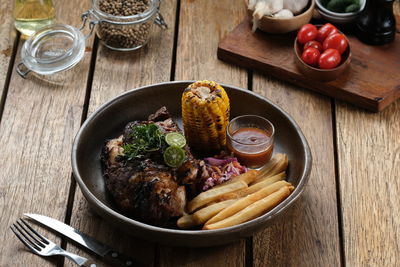 Barbeque grilled ribs served on a neatly arranged plate