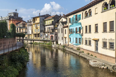The historic center of omegna with beautiful buildings near the river