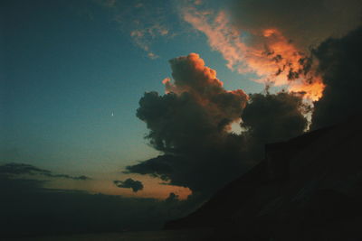 Low angle view of silhouette tree against sky at sunset