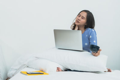 Young woman using mobile phone