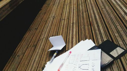 High angle view of paper on table