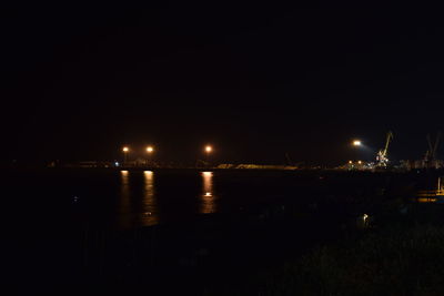 Reflection of illuminated buildings in water