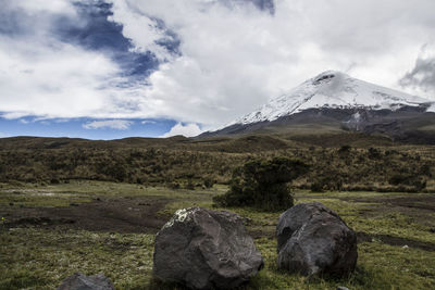 Scenic view of snowcapped mountains against sky