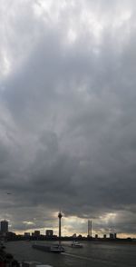 View of bridge against cloudy sky