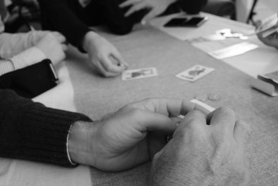 Low section of man playing on table