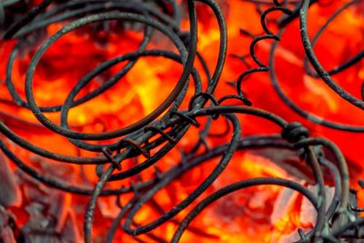 Close-up of coiled springs in bonfire