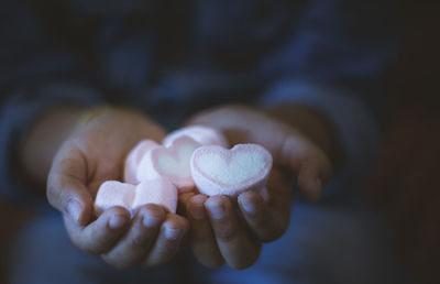 Close-up of hand holding ice cream