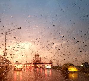 Raindrops on glass window during rainy season