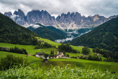 Scenic view of landscape and mountains against sky