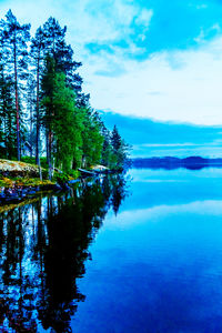 Reflection of clouds in calm lake