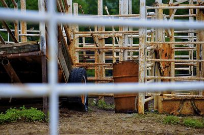 Old cart and barrel on field