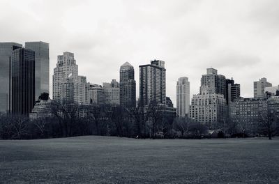 Modern buildings in city against sky