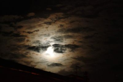 Low angle view of moon in sky at night