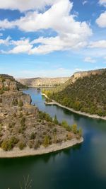 Scenic view of river against sky