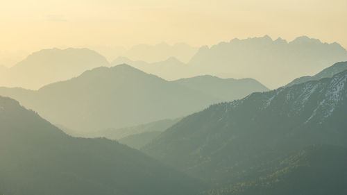 Scenic view of mountains against sky during sunset