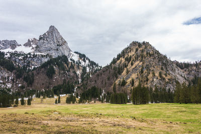 Scenic view of snowcapped mountains against sky