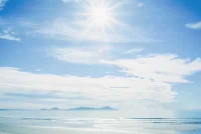 Scenic view of sea against sky on sunny day