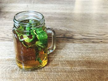 High angle view of glass jar on table