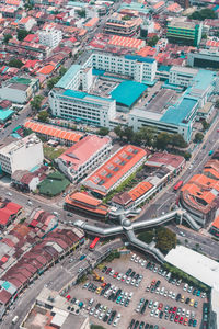 High angle view of street amidst buildings in city