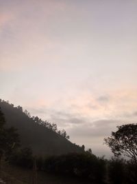 Scenic view of mountains against sky during sunset