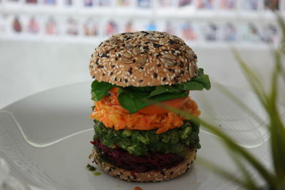 Close-up of burger in plate on table