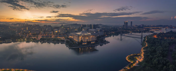 High angle view of city buildings during sunset