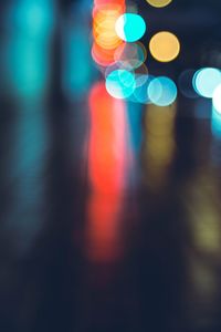 Defocused image of colorful illuminated lights at night