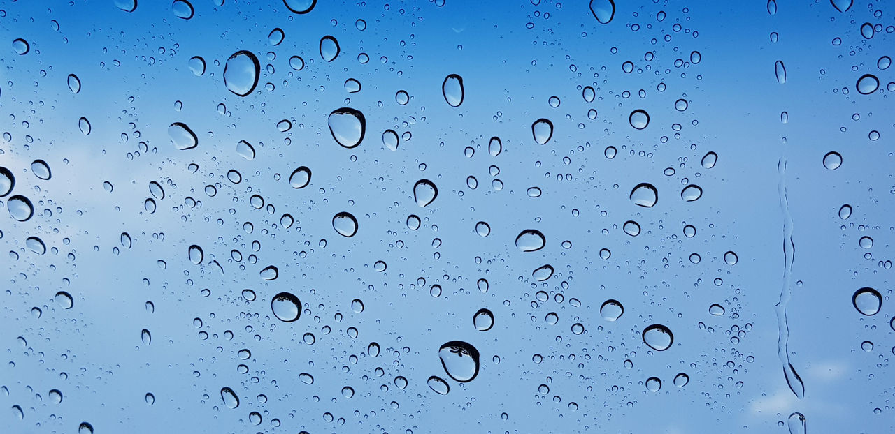 drop, water, wet, no people, backgrounds, transparent, window, close-up, full frame, nature, rain, glass, blue, indoors, pattern, raindrop, sky, purity, freshness, simplicity, abstract, black and white