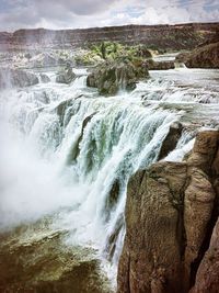 Scenic view of waterfall