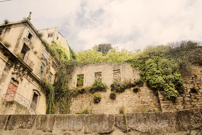 Low angle view of old building against sky