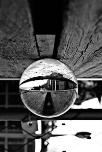 Close-up of crystal ball on glass