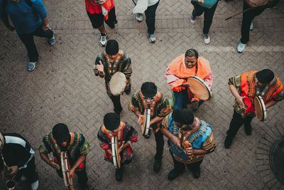 High angle view of people walking on street